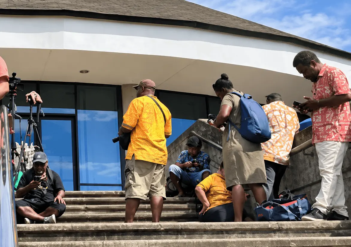 Journalists wait for the declaration of Matthew Wale as Solomon Islands Prime Minister.