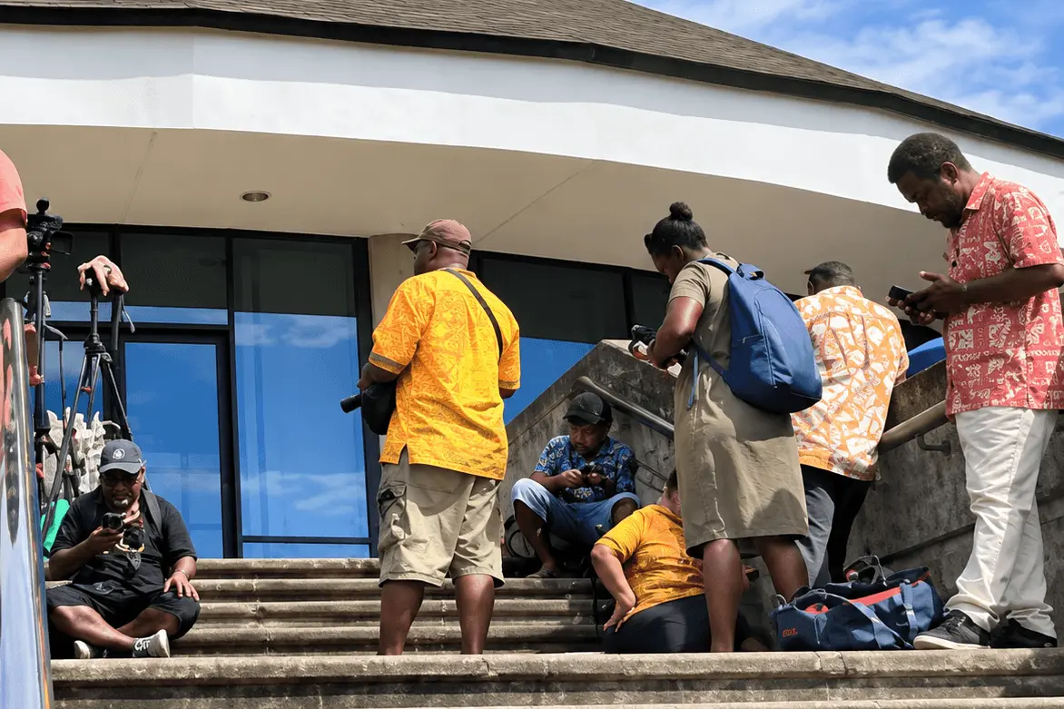 Journalists wait for the declaration of Matthew Wale as Solomon Islands Prime Minister.