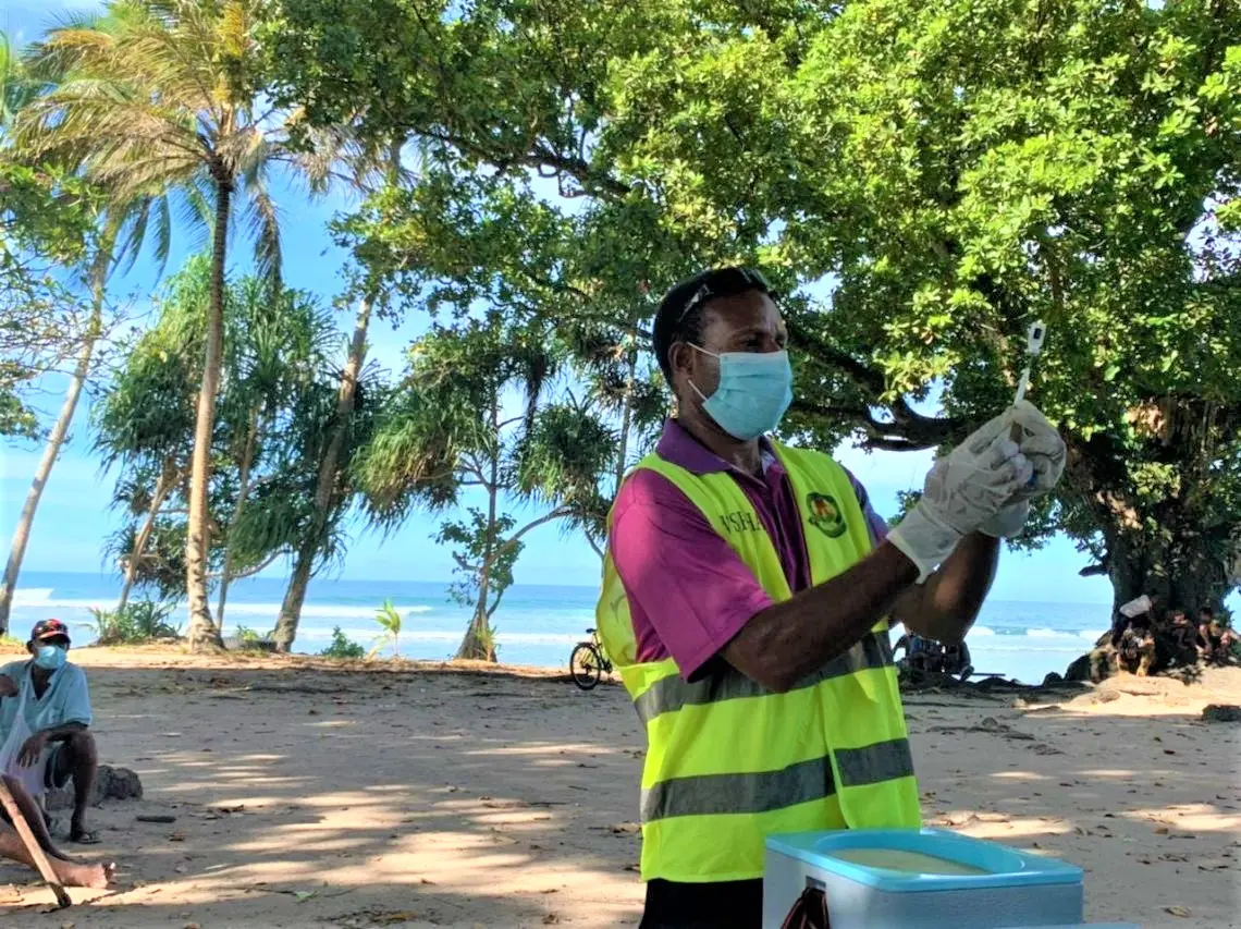 Vaccination drive in Waromo Village, West Sepik, Papua New Guinea.