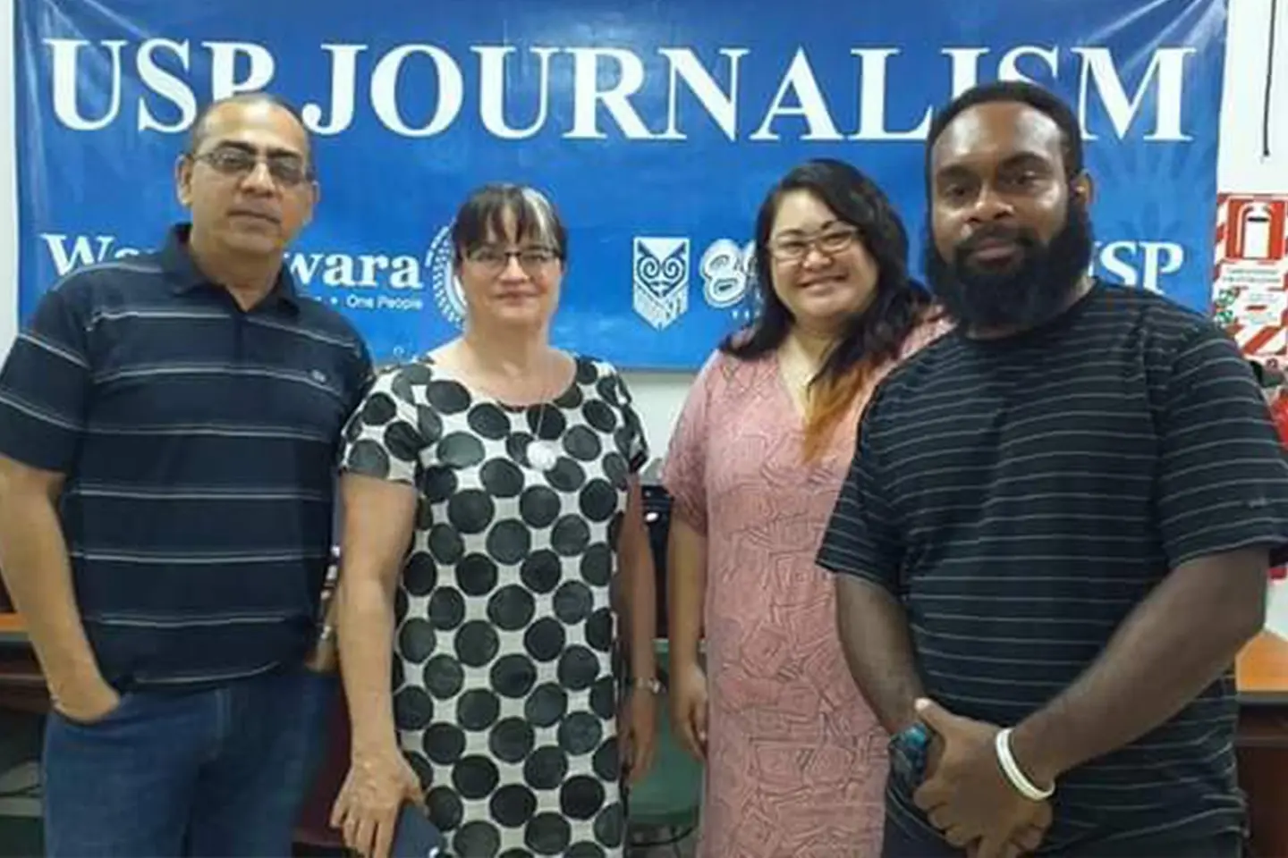 Associate Professor in Pacific Journalism at the School of Pacific Arts, Communication, and Education (SPACE), Shailendra Singh with Journalism teaching assistants.
