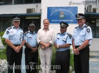 PPF Commander Denis McDermott, Acting Deputy Commissioner Edmund Sikua, Minister for Home Affairs Bob Debus and Acting Commissioner Walter Kola with AFP Assistant Commissioner Frank Prendergast.