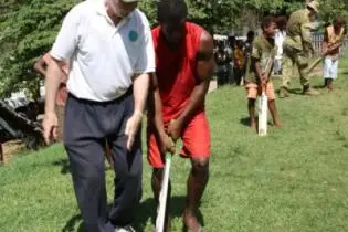 S.I Cricket Association member, Mr. Graeme Wilson during a cricket lesson.