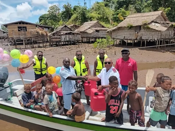Back row from left-right. Mr. Avix Manehava Hospital Driver, RN Eric Zama Kia AHC, Mr. James Datho Kia AHC Driver and Mr. Jonathan Liloro Bauro FC & Advisor-Buala Hospital, Center-RN Joseph Patolo and DoN-s Martin Gavira Isabel Province and Kids of Vageza Area, Kia Village.