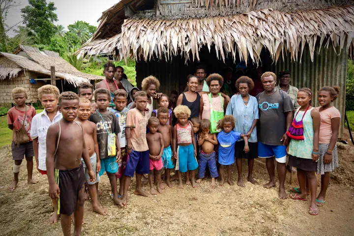 Helen, Afunakwa's daughter, and Clement Iata, one of her grandsons, with their community in Kalifasia village, north-east Malaita.