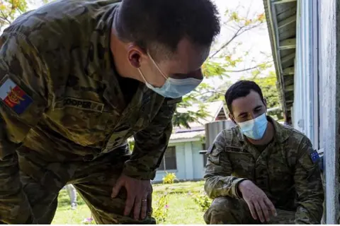 Australian Army engineers, Lieutenant Colonel Gavin Cooper and Captain Luke Staples inspect the National Referral Hospital in Honiara for damage.