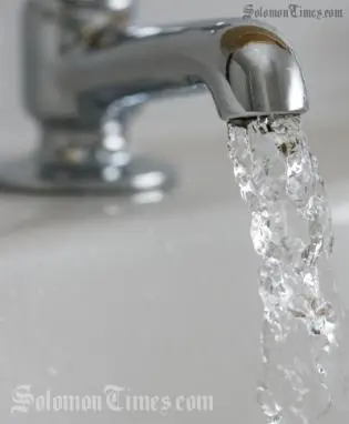 File photo: Water running from a tap.