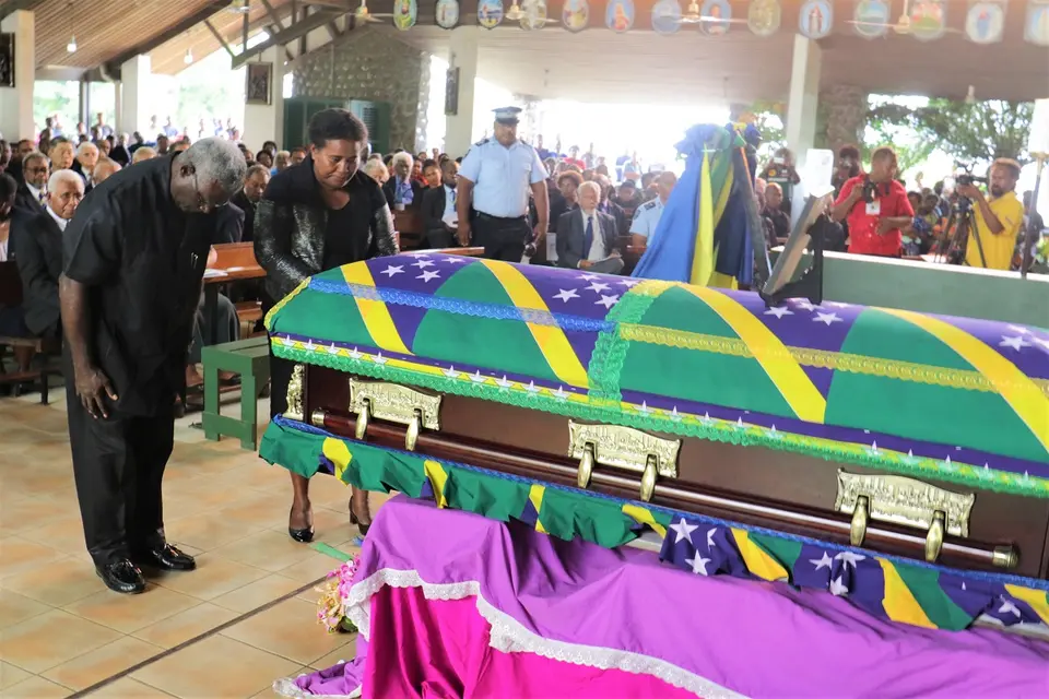 Prime Minister Manasseh Sogavare and Madam Sogavare pay their last respects at the funeral service.