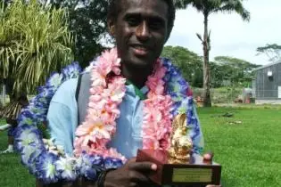 Kurukuru Captain, Elliot Ragomo, with his Golden Boot award, won on the recent trip.