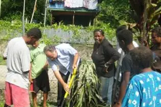 Mr Ingruber and the students planted a tree in the grounds of the Special Development Centre, to improve the environment around the school.