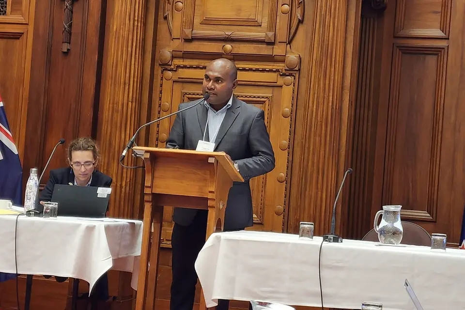 MRD Permanent Secretary Dr. Samson Viulu presenting the new and first ever SICD Policy to the meeting audience.