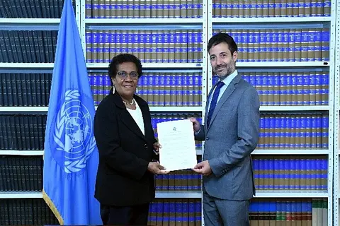 Ambassador and Permanent Representative of Solomon Islands to the United Nations, H.E Mrs. Jane Mugafalu Kabui Waetara and Mr. David Nanopoulos, Chief of the United Nations Treaty Office during the deposit ceremony.
