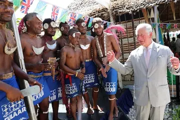 Prince Charles danced with a pan pipe band at the reception at the Governor General's residence.