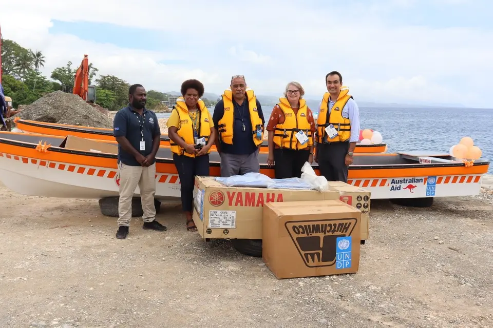 Australian High Commission, UNDP and N-DOC members posed with the boats and equipment.
