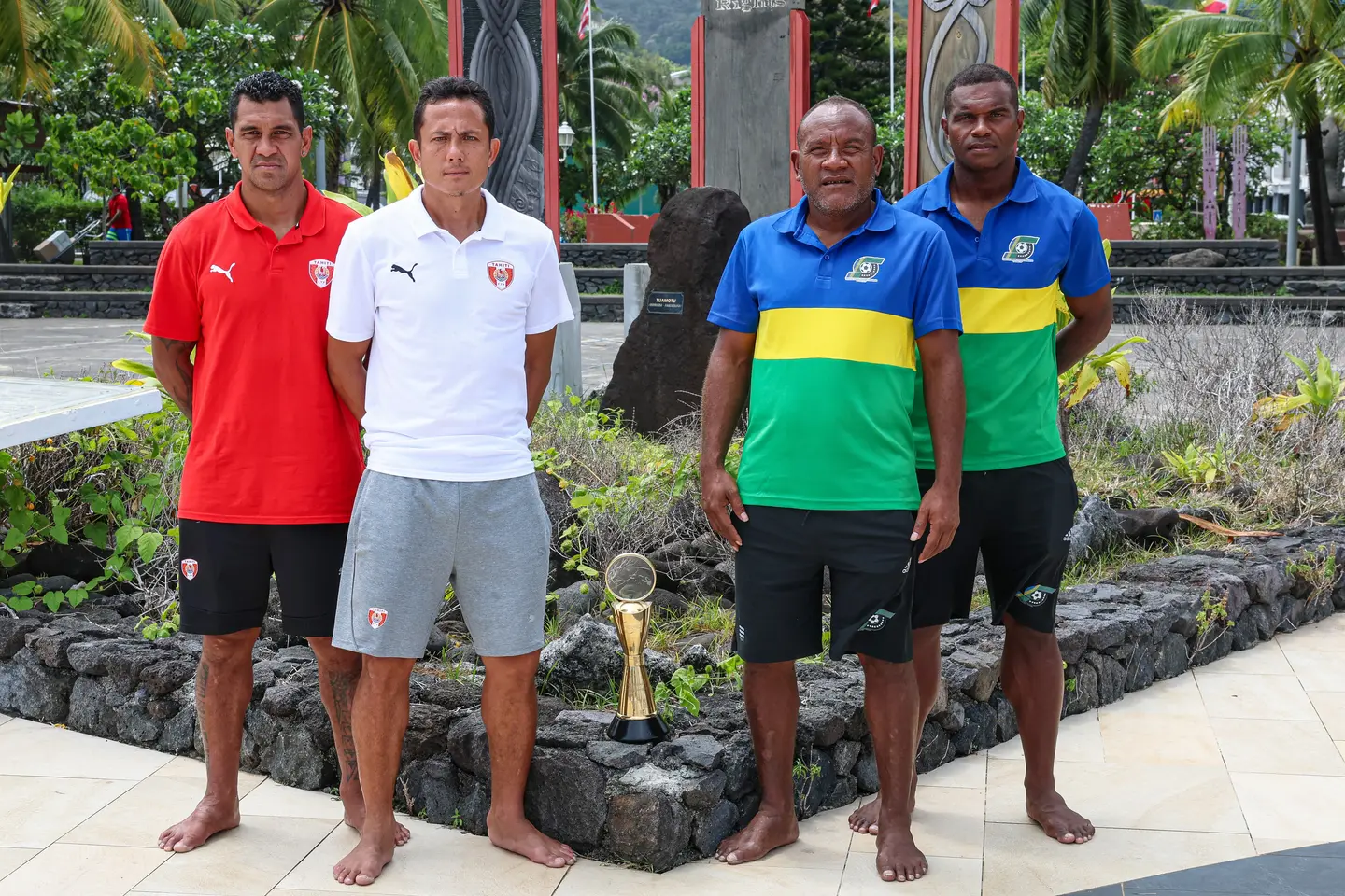 The coaches and captains of Tahiti and Solomon Islands with the trophy at the pre-final media opportunity in Papeete on 30 October.