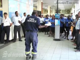 RSIPF Fire Service's Inspector Rodney Kuma entertained and educated bank staff during his fire safety lecture.