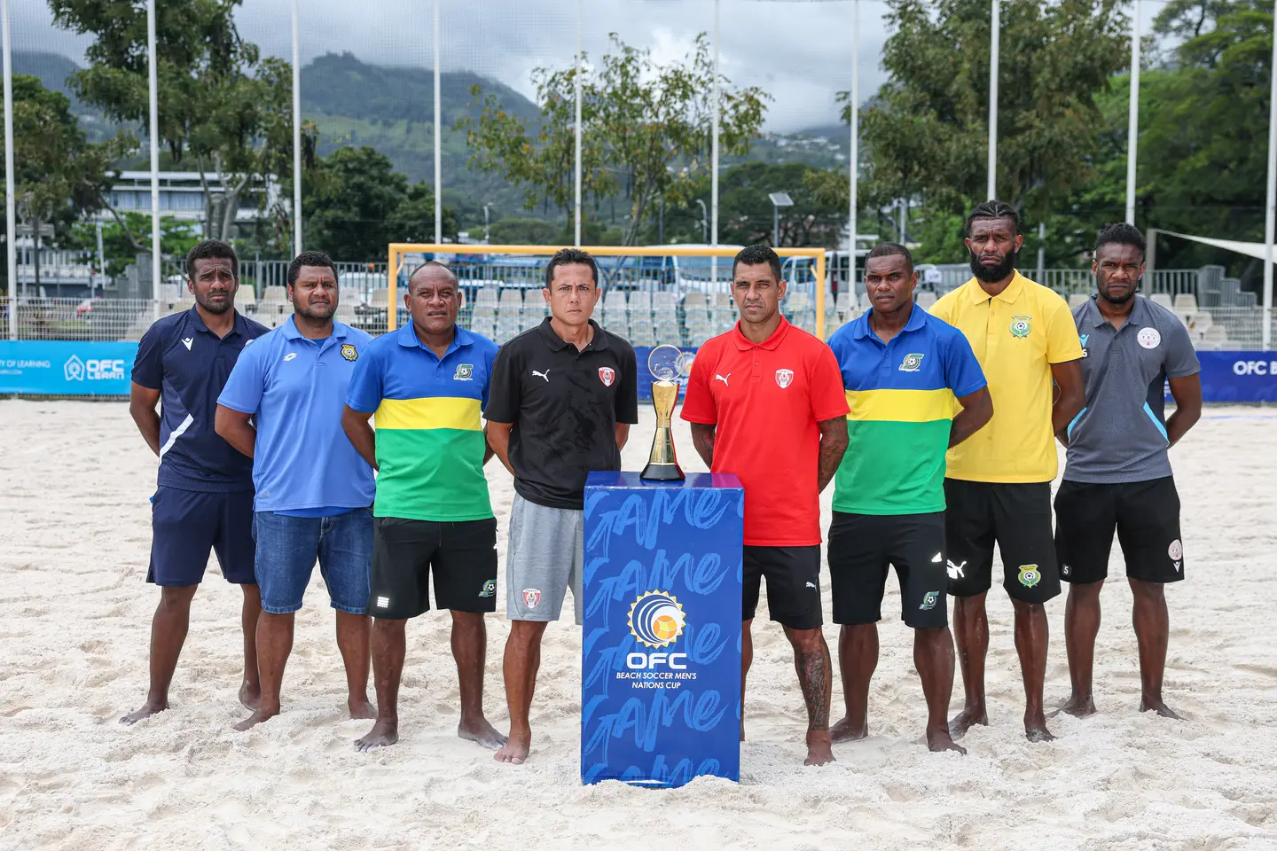 Coaches and captains of the four teams with the OFC Beach Soccer Men's Nations Cup trophy at Aorai Tini Hau in Pirae, Tahiti