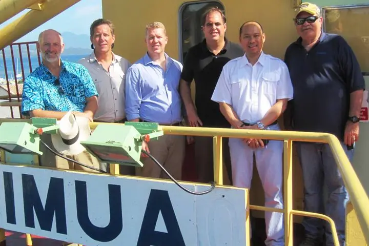 (Left to Right) Jonathon Ogle, division manager for Matson, Glenn Bennett, Managing Director of Silentworld, Craig Vegar, Sales manager for Matson, Meyric Slimming, CEO Silentworld, the Captain of the Imua, Captain Glorioso and Rusty Leonard, Matso’s head of Stevedoring.