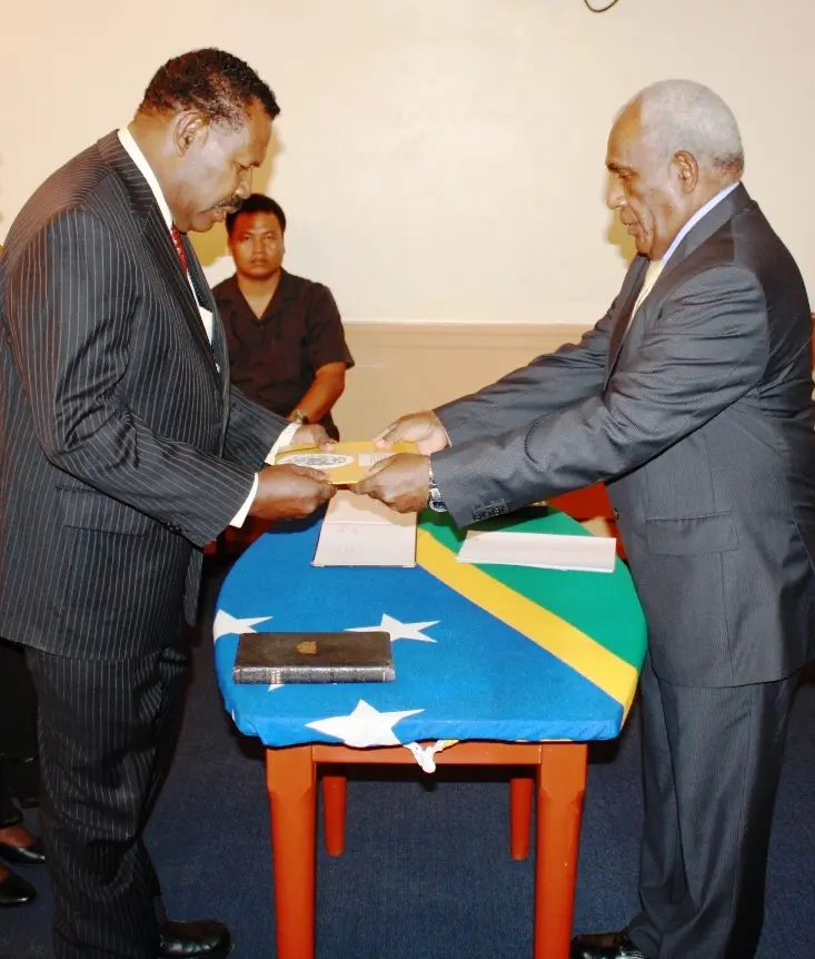 Mr Ngele receives his credentials from Sir Frank on Friday.