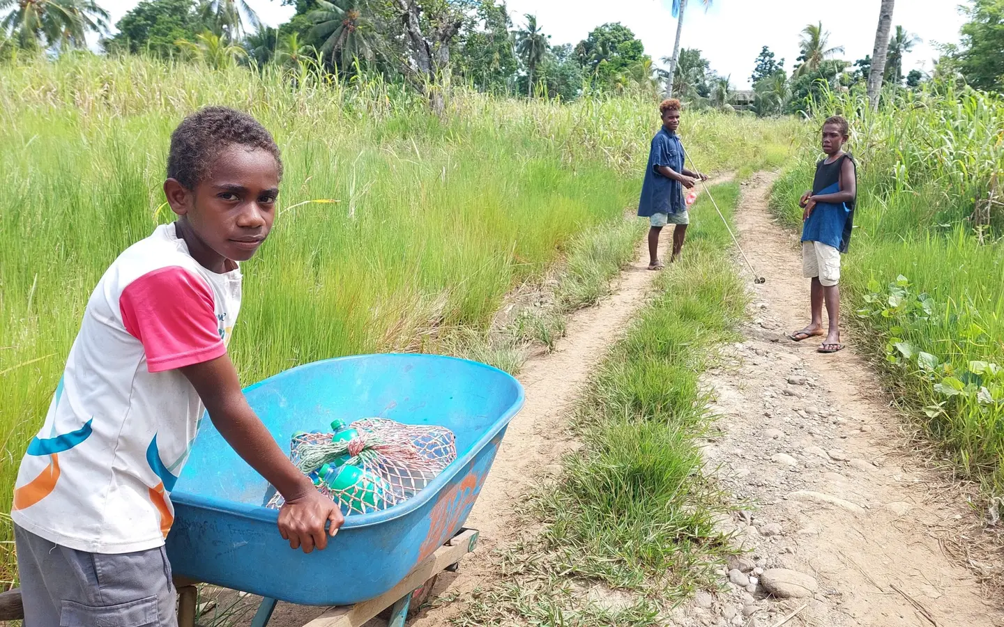 “With the full installation of the water supply system here, I will no longer travel far to collect clean water for drinking and cooking using my wheelbarrow,” says Alphonse Bua.