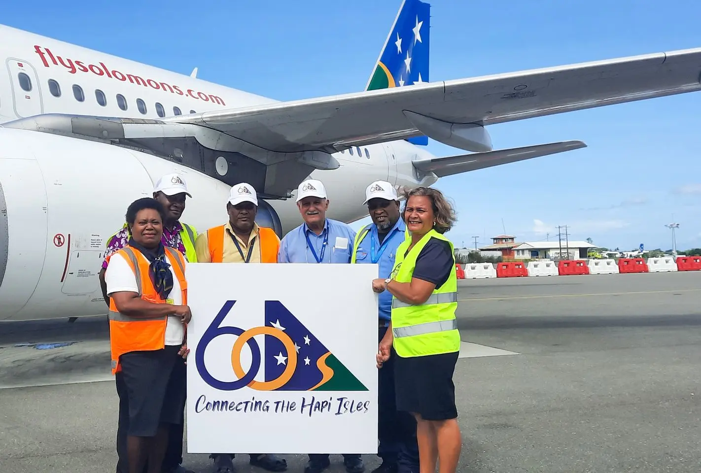 Long-serving Solomon Airlines staff with CEO Gus Kraus – pictured left to right including their time with Solomon Airlines Florence Padabela (35 years),Timothy Neuwa (26 years), John Berry Anga (27 years).