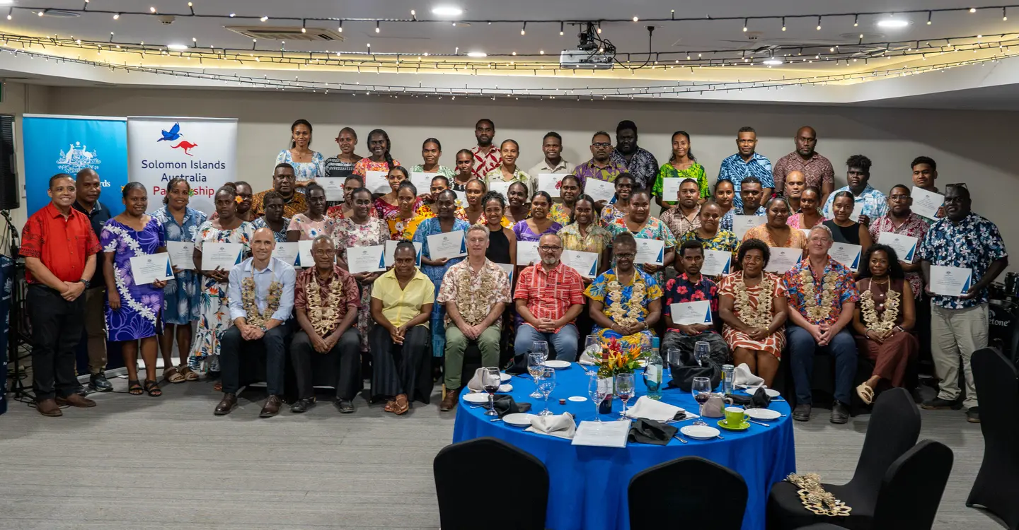 Australia Awards scholars with the prime minister, the Australian high commissioner and government and DFAT officials at the farewell dinner for the 2027 intake