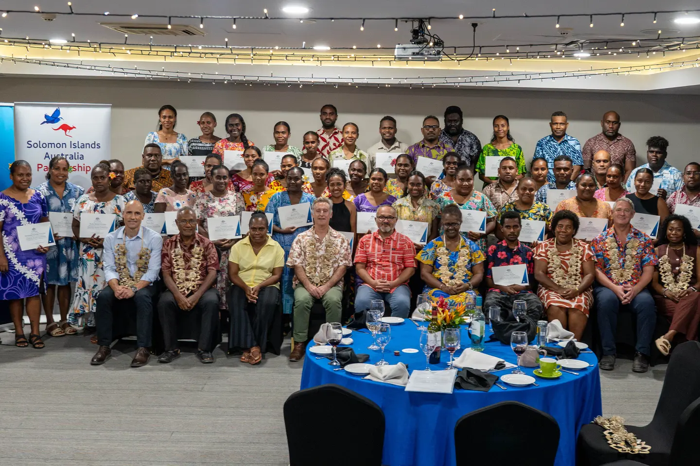Australia Awards scholars with the prime minister, the Australian high commissioner and government and DFAT officials at the farewell dinner for the 2027 intake