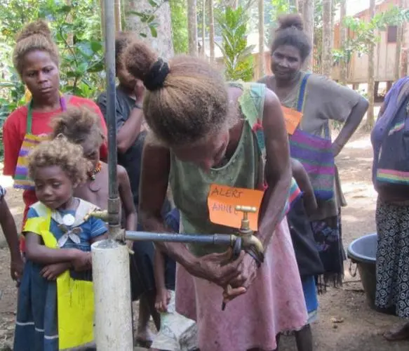 Women caretakers in Veravoulu village practising how to repair taps.
