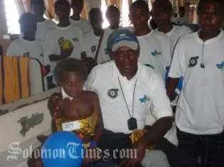 The LEARN & play team with their coach, while distributing presents to Children at the Children's Ward on Christmas.