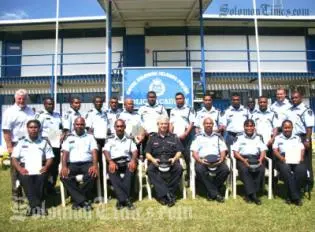 Police Commissioner Peter Marshall with the 17 newly graduated police prosecutors.