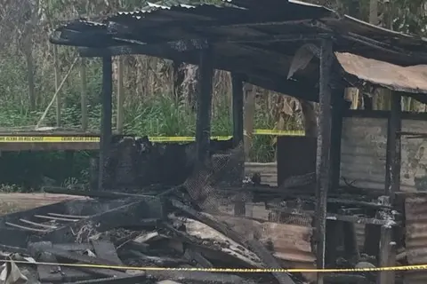 It is alleged that the father poured petrol over their home using a 1.5-liter bottle, which ignited the blaze.