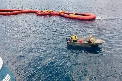 Clean up efforts after the oil spill off Rennell Island in Solomon Islands.