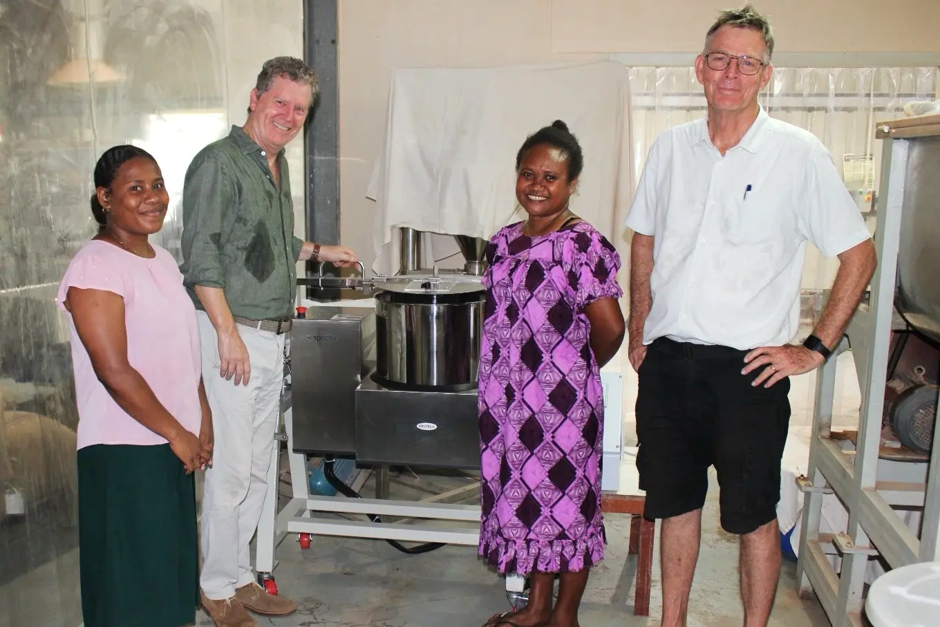 British High Commissioner Paul Turner with KOSI managers Clare Magusi and Maureen Taro, and CEO Bob Pollard.