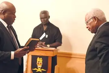 New Minister for Police, National Security and Correctional Services Anthony Veke sworn-in before the Governor General.