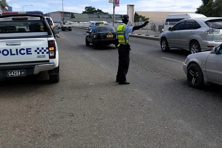 An RSIPF officer control traffic during the operation.