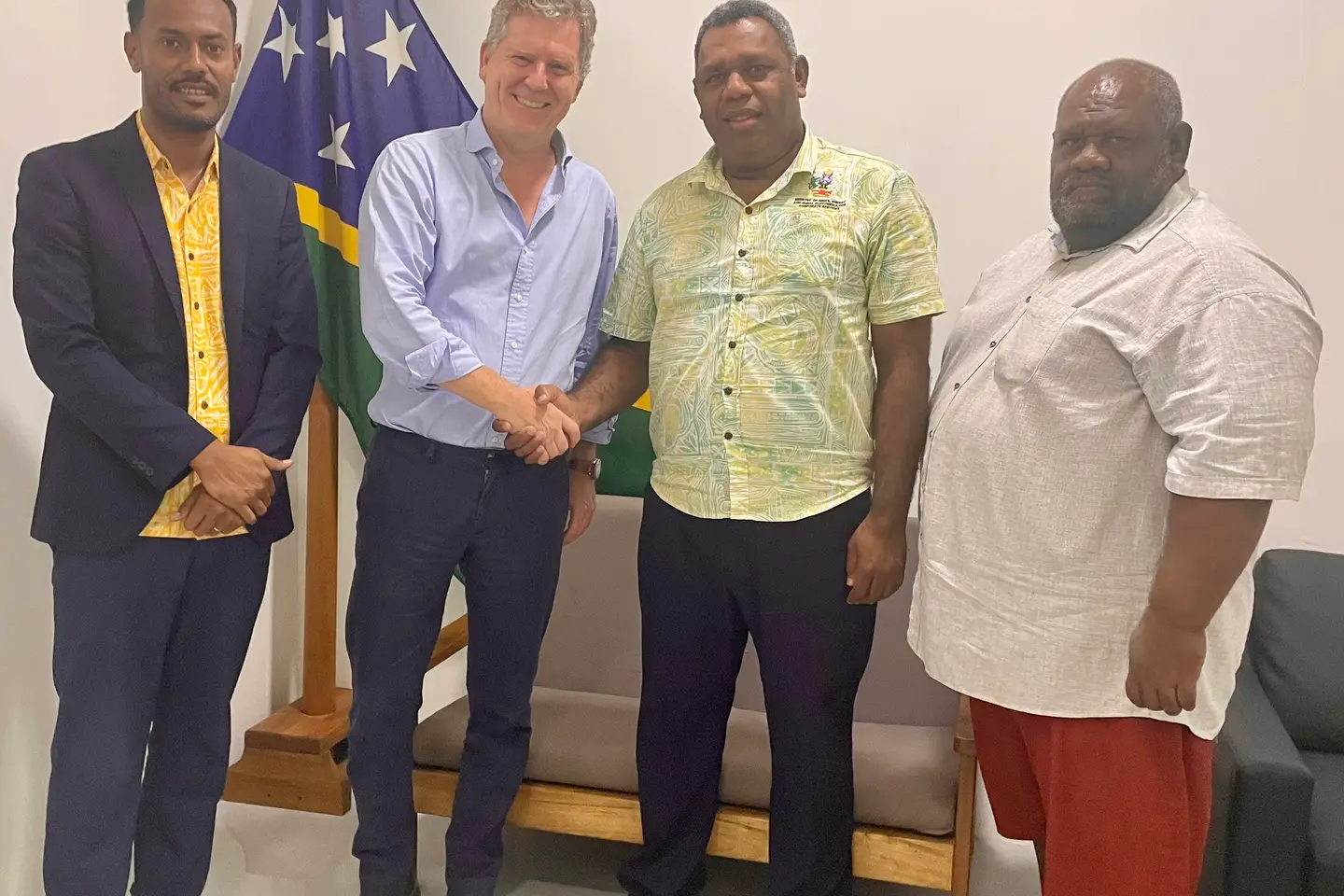 British High Commissioner Paul Turner with Permanent Secretary Chris Vehe, William Kadi and Director Gabriel Aimaea.
