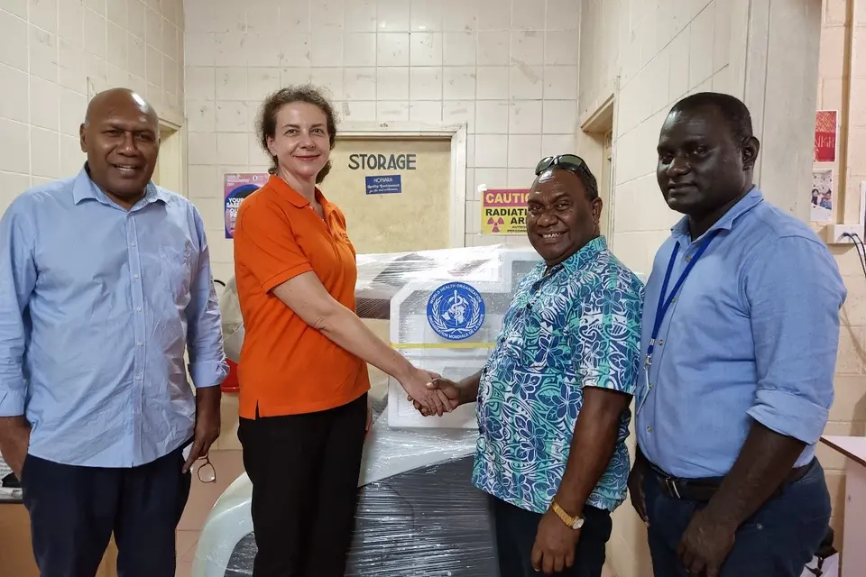 Handing over of X-ray machine by WHO OIC Dr Sonja Tanevska (centre left) to NRH Medical Superintendent, Dr John Hue.