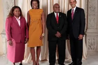 Fred Fono and Mrs. Helen Fono with President Obama and First Lady Michelle Obama during a reception at the Metropolitan Museum in New York.