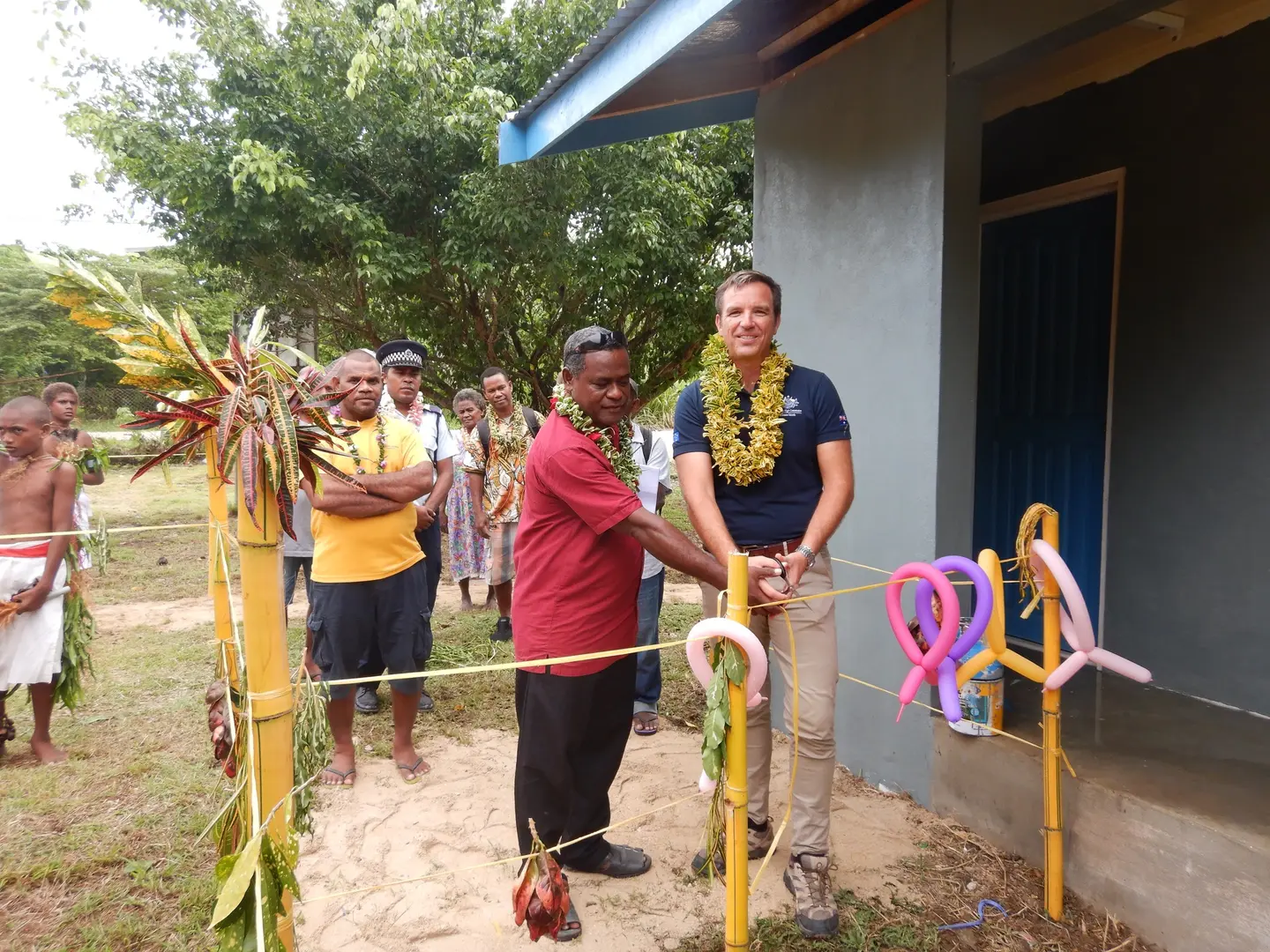 The Arnon Atomea ablution block Project Coordinator, Mr. Lensley Kwaimani and Australian High Commission's 2nd Secretary Political, Mr. John Russell during the handover ceremony.