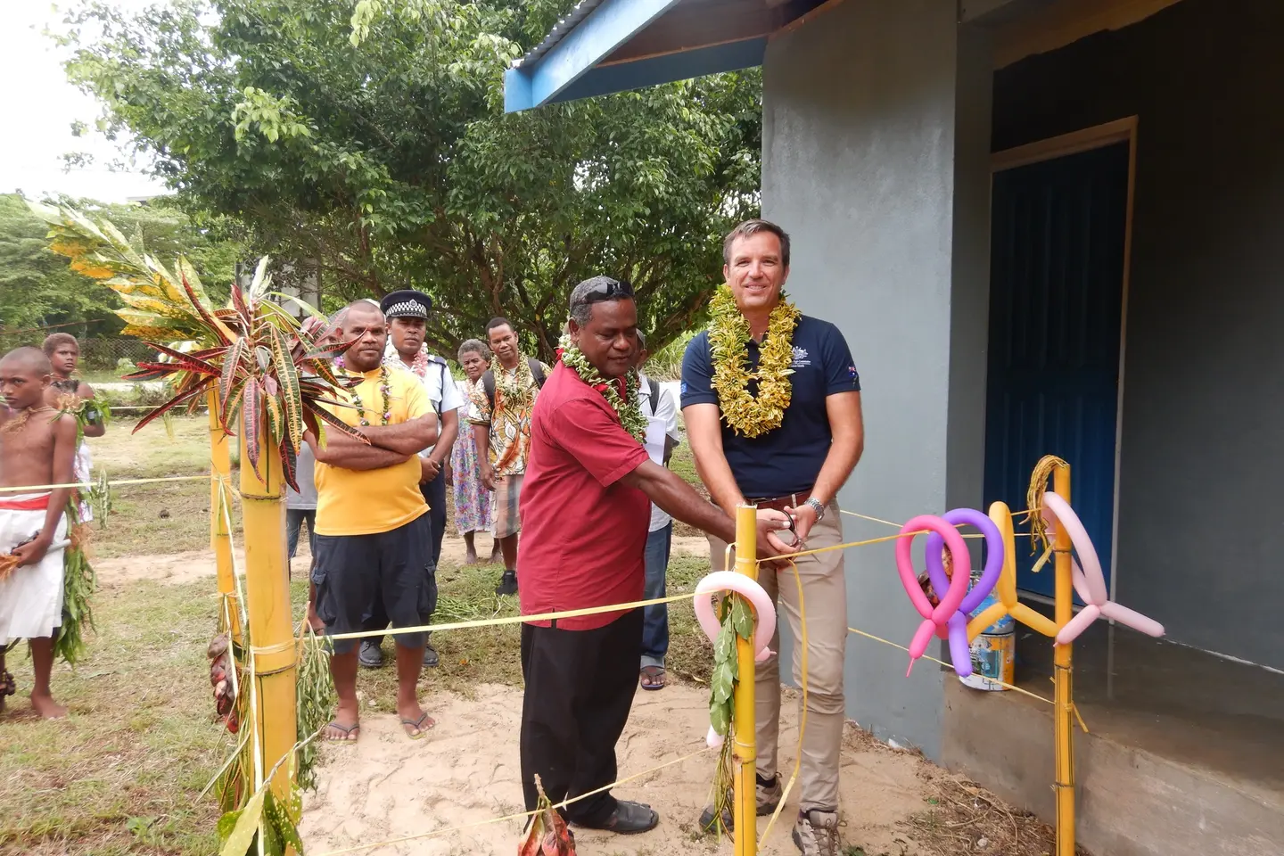 The Arnon Atomea ablution block Project Coordinator, Mr. Lensley Kwaimani and Australian High Commission's 2nd Secretary Political, Mr. John Russell during the handover ceremony.