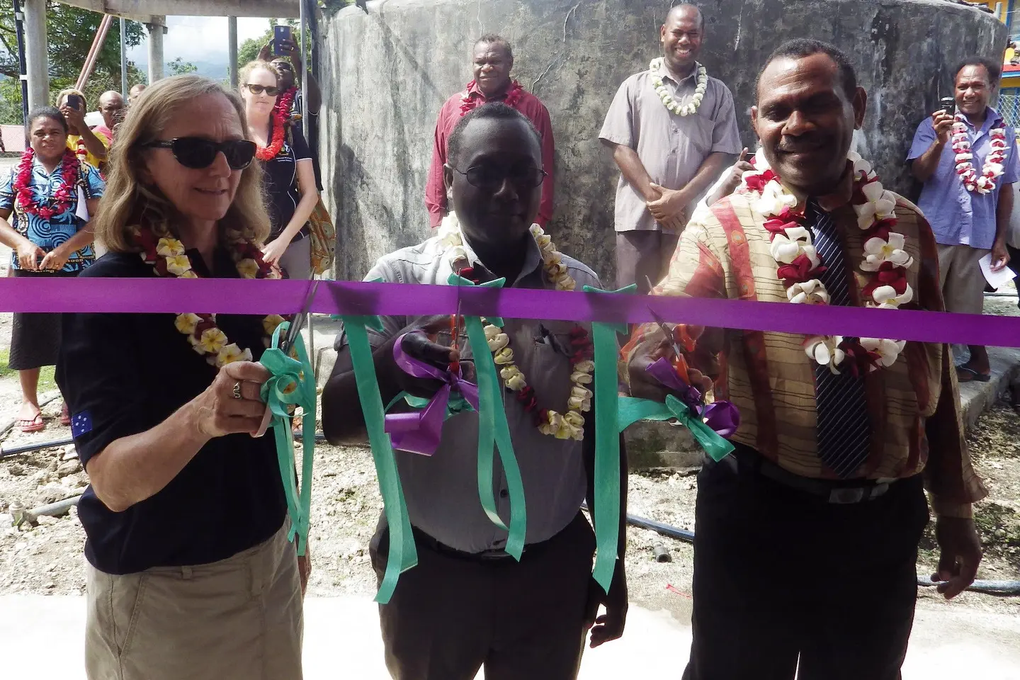 Ribbon cutting by Gina De Pretto, First Secretary Health Australian High Commission, Dr Greg Jilini, Under Secretary Health Care, Ministry of Health and Medical Services and Alfred Dagi, Provincial Minister of Health, Temotu Province.