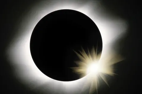 During the eclipse, the moon goes directly in front of the Sun completely blocking it out treating Solomon Islanders to a beautiful display of the solar corona.