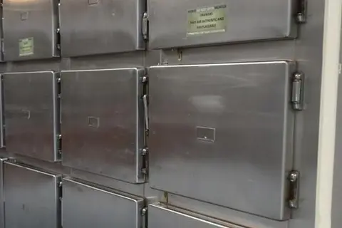 NRH says the graphic picture of blood all over the floor of the morgue that accompanied the media article is part of an embalmment procedure. Therefore, must not be considered or believed to be the usual daily status of the morgue’s level of hygiene.