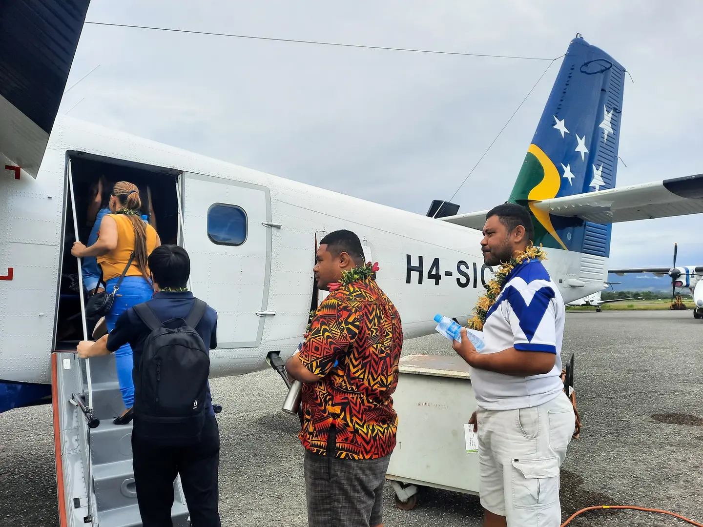 Passengers boarding the VIP scenic flight prior to pilot briefing and take off at Henderson Airport.