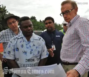 Australia's Foreign Minister, Senator Bob Carr and Mr. Virivolomo of the Solomon Islands Ministry of Infrastructure.