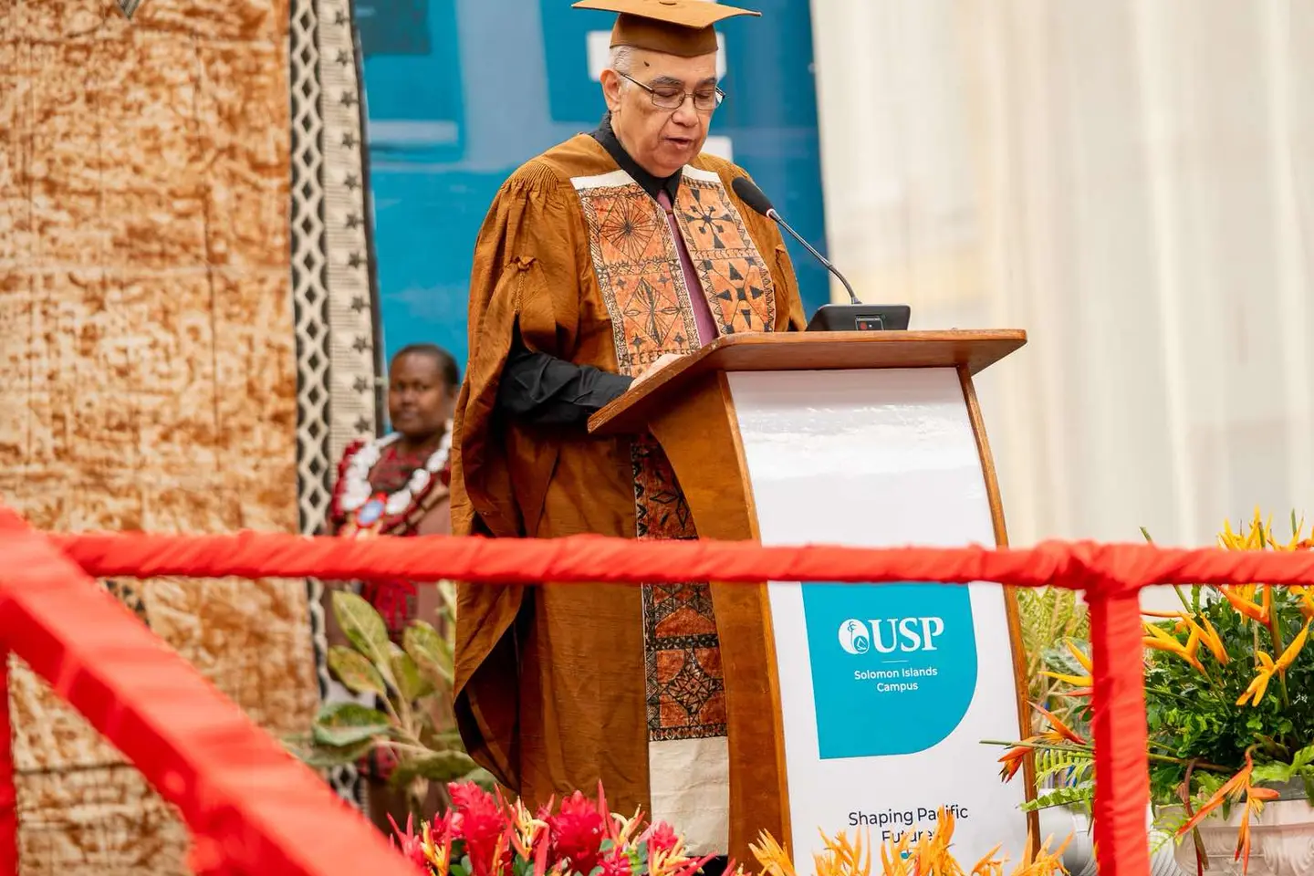 USP Pro-Chancellor and Chair of Council and Interim Management Group Siosiua Utoikamanu delivers the graduation address at the USP Solomon Islands Campus graduation at Friendship Hall in Honiara.