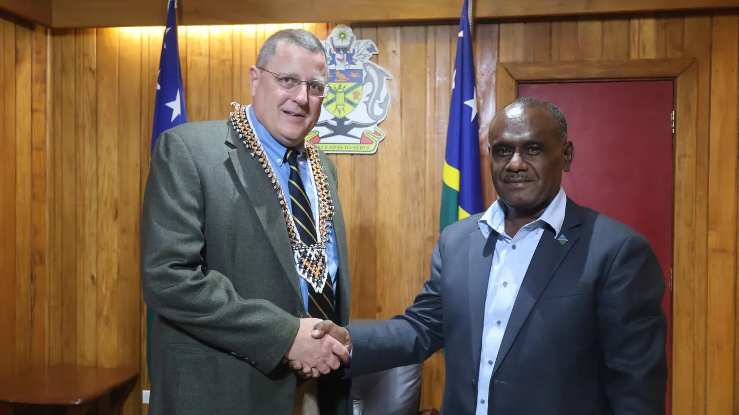 Prime Minister, Hon. Jeremiah Manele and U.S. Senate Minority Clerk, Mr. Paul Grove.