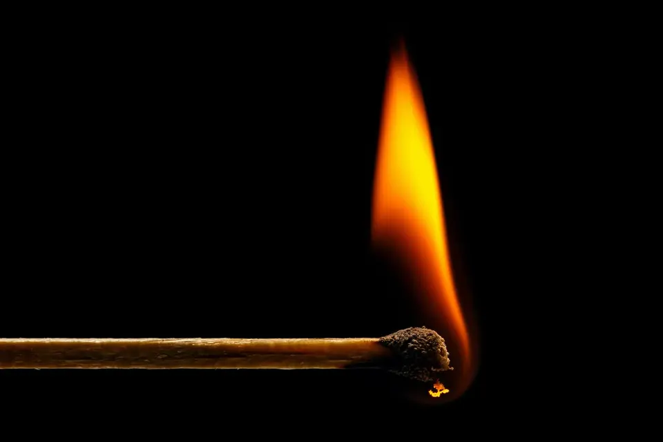 The incident report states that the suspect went to the victim’s dwelling house and lit a fire on the walling while the victim was sleeping.