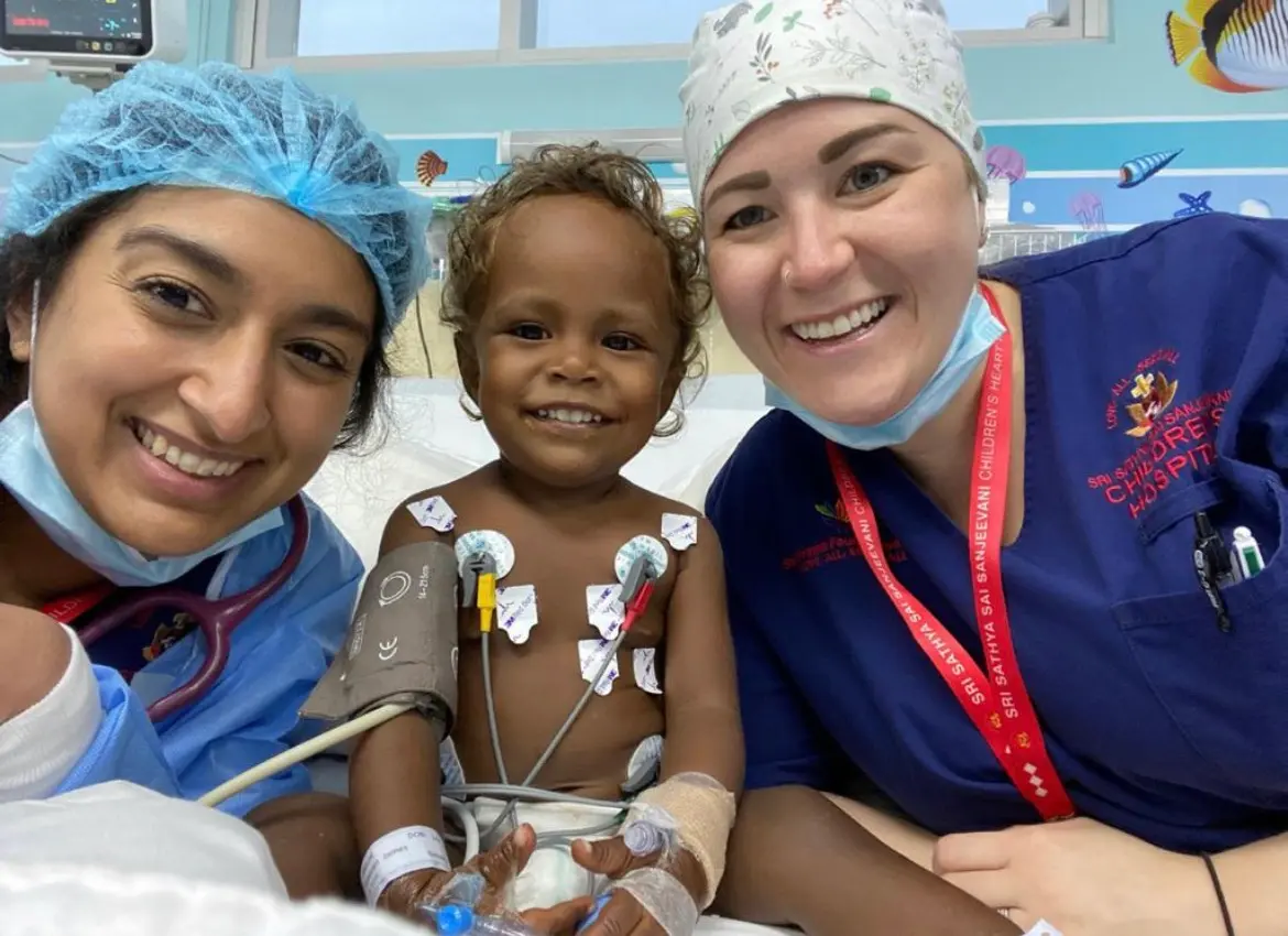 Little Beverlyn with members of the specialist team after her surgery.