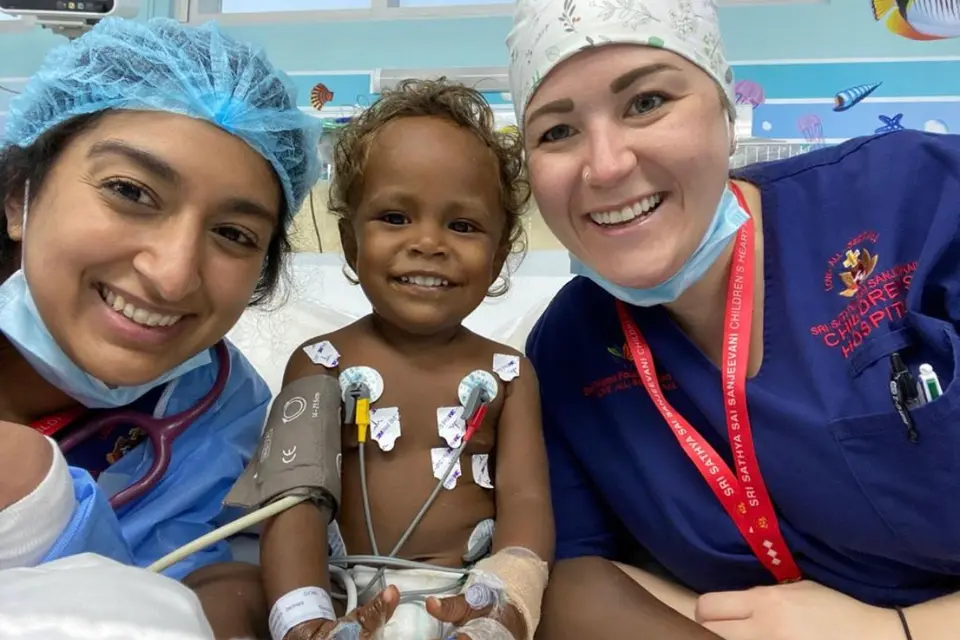 Little Beverlyn with members of the specialist team after her surgery.