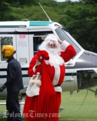 Santa adjusts his hat after a landing practice for next week's 'Carols in the Islands', to be held at Lawson Tama Stadium on Saturday 12 December.